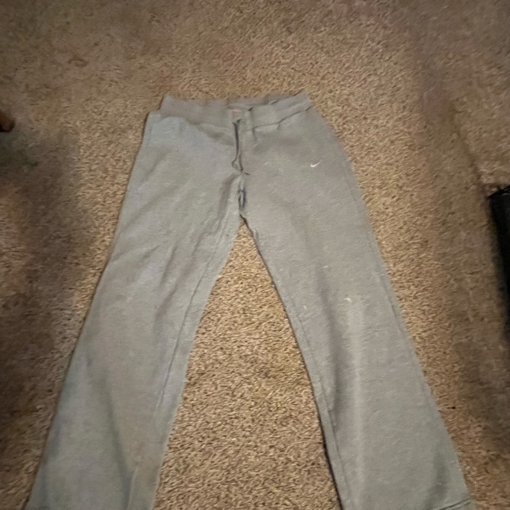 Nike sweatpants with wide legs.
